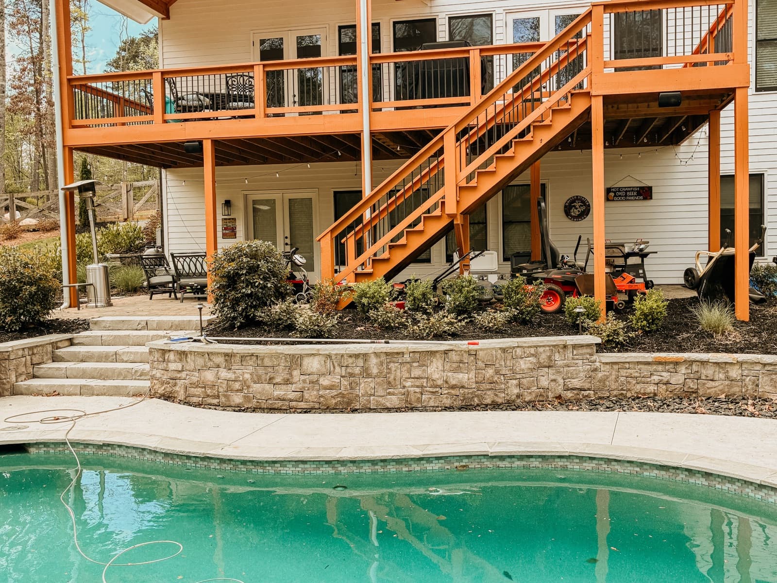 Outdoor speakers driven by a Sonos amp around a pool area